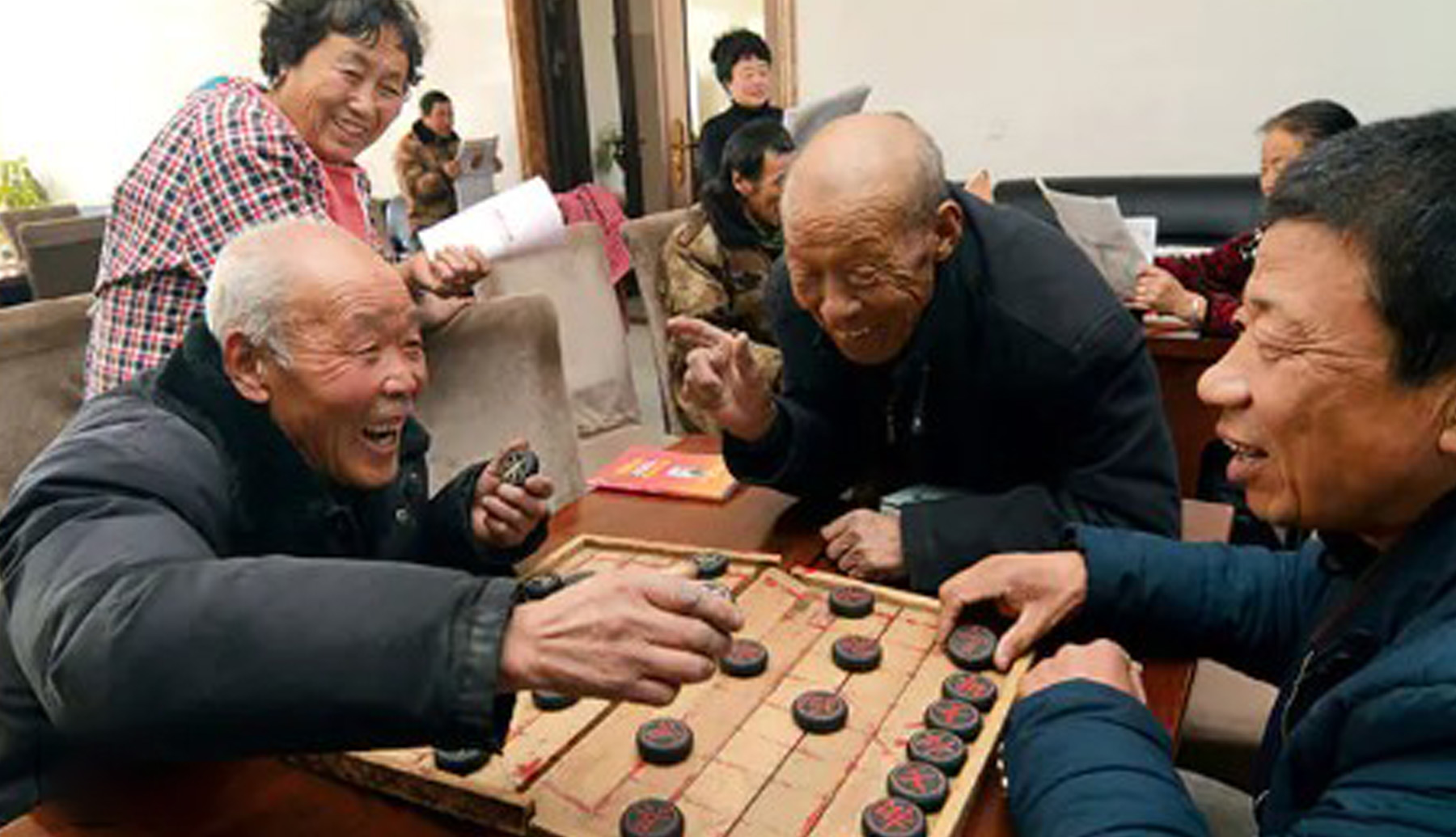 photograph showing seniors involving in a chess game